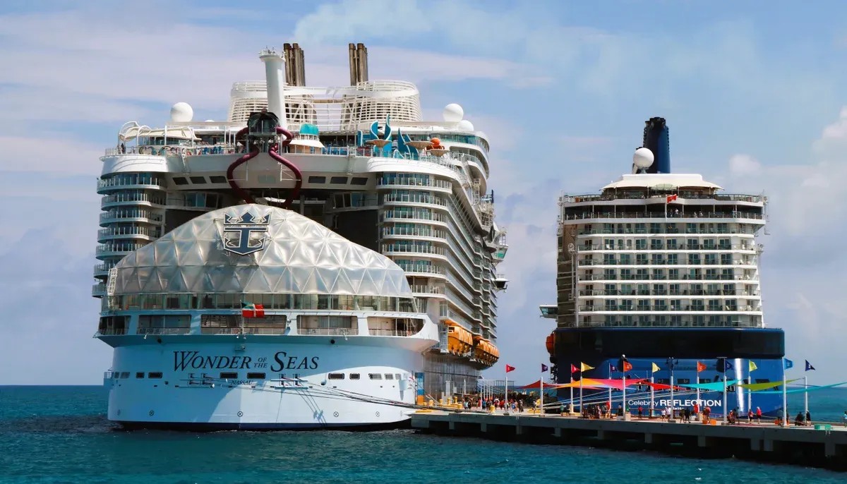 Two cruise ships moored at the CocoCay pier on a Perfect Day at CocoCay