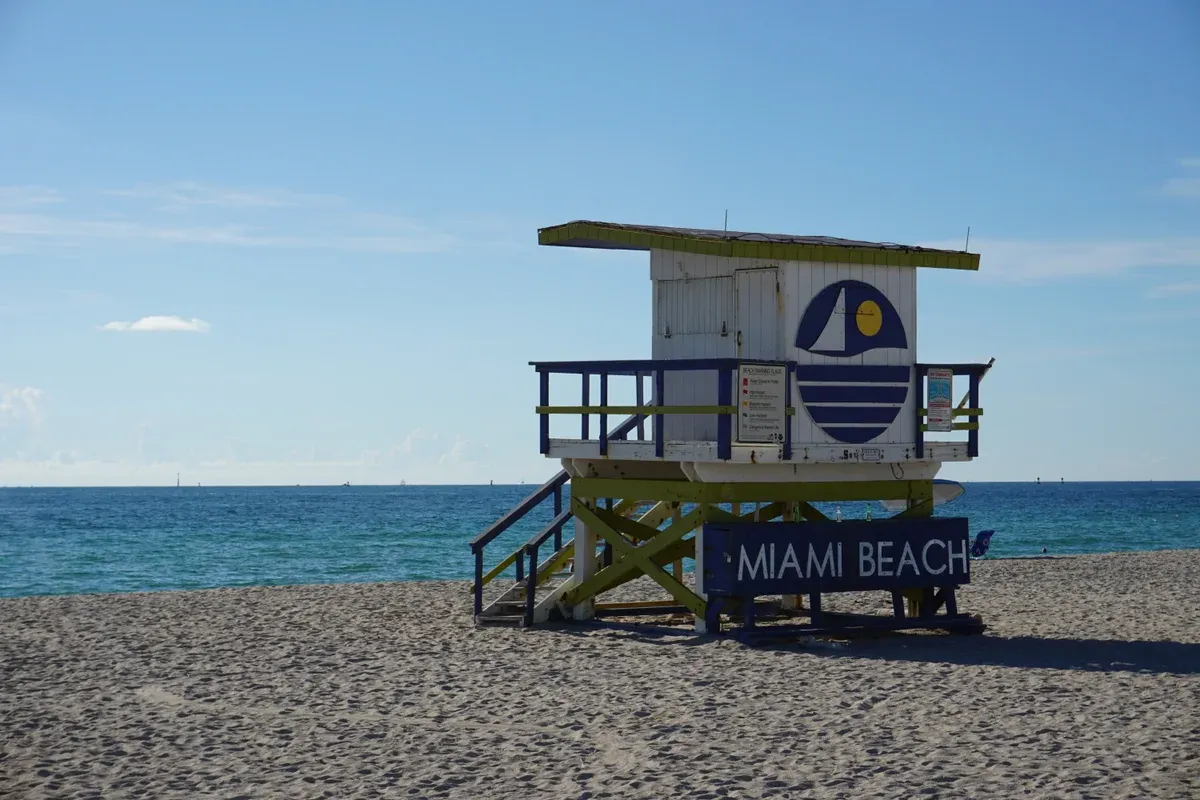 Lifeguard tower on South Beach at sunrise, part of a 2-day trip from Miami