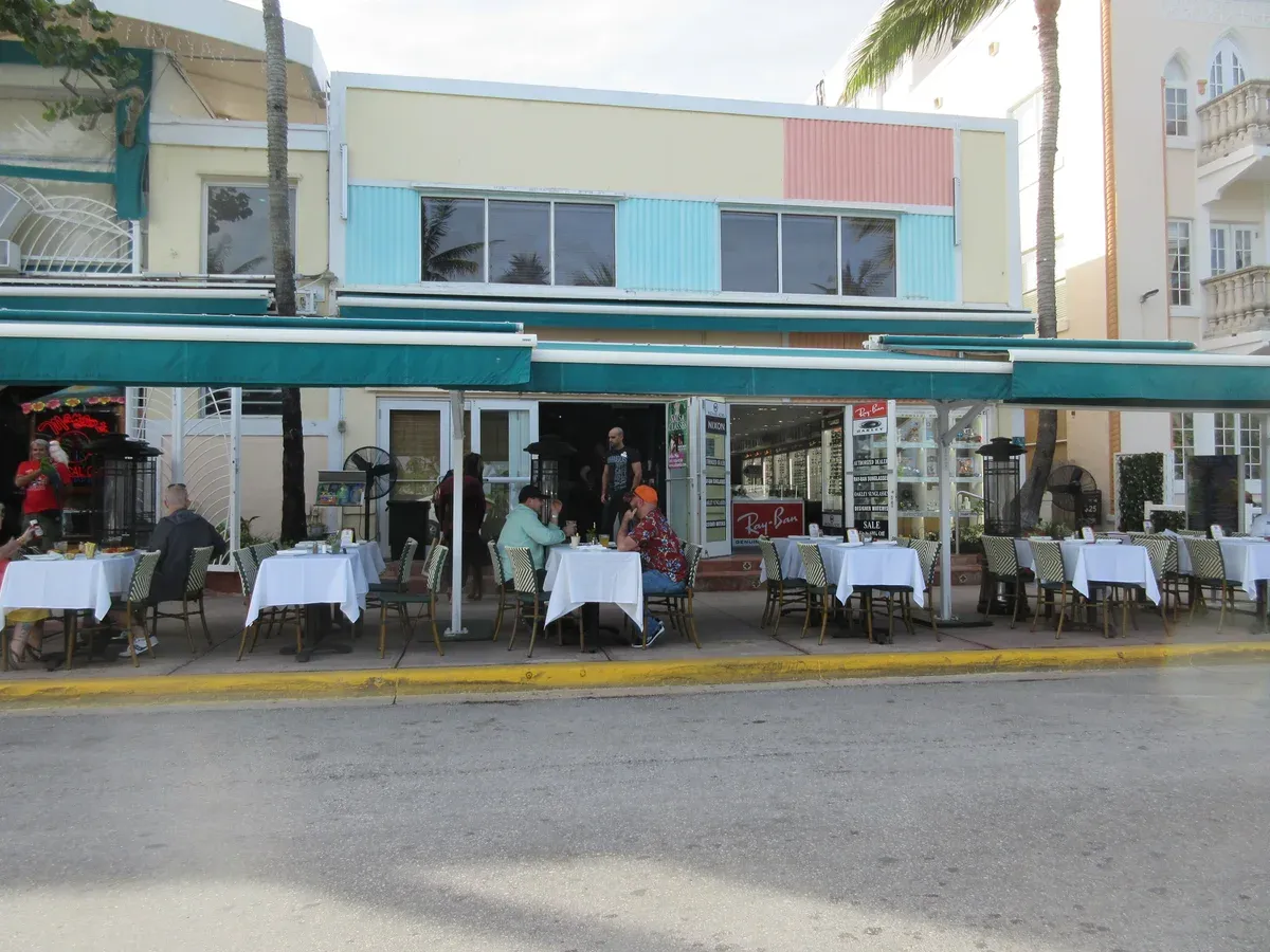 Cafe tables along Ocean Drive in South Beach, part of a 2-day trip from Miami